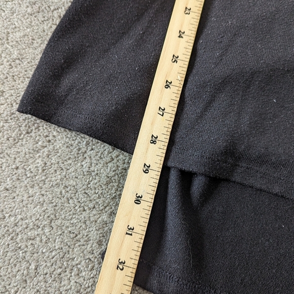 Another Story Elegant Long-Sleeve Black Draped Top with Button Detail and Pocket - Picture 9 of 9